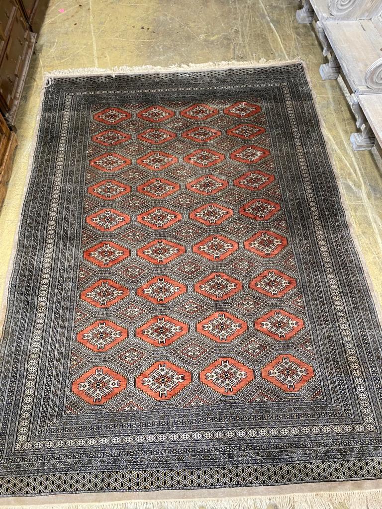 A Bokhara style rug, 273 x 194cm